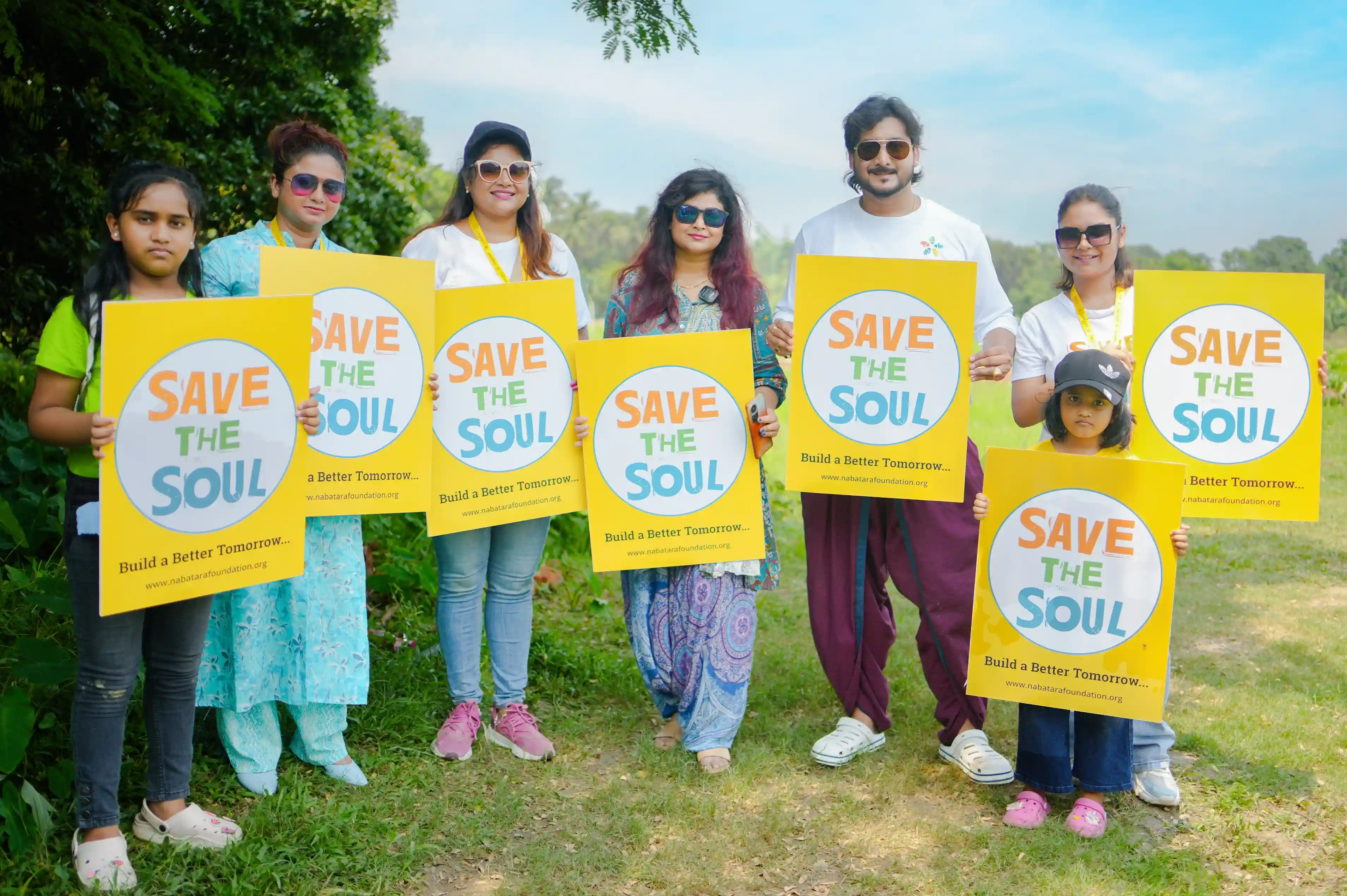 Group of underprivileged women in Kolkata proudly holding handmade products and certificates during a Nabatara Foundation – Save The Soul inspiring women to rise NGO Kolkata India skill training and empowerment workshop